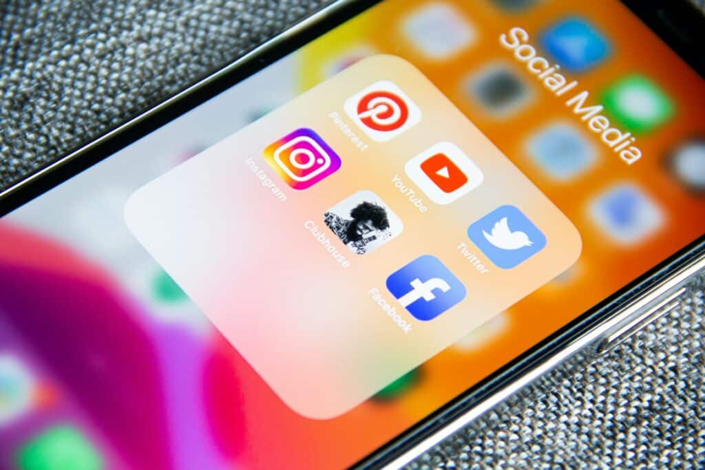 A phone screen displaying social media apps, representing employee social media.
