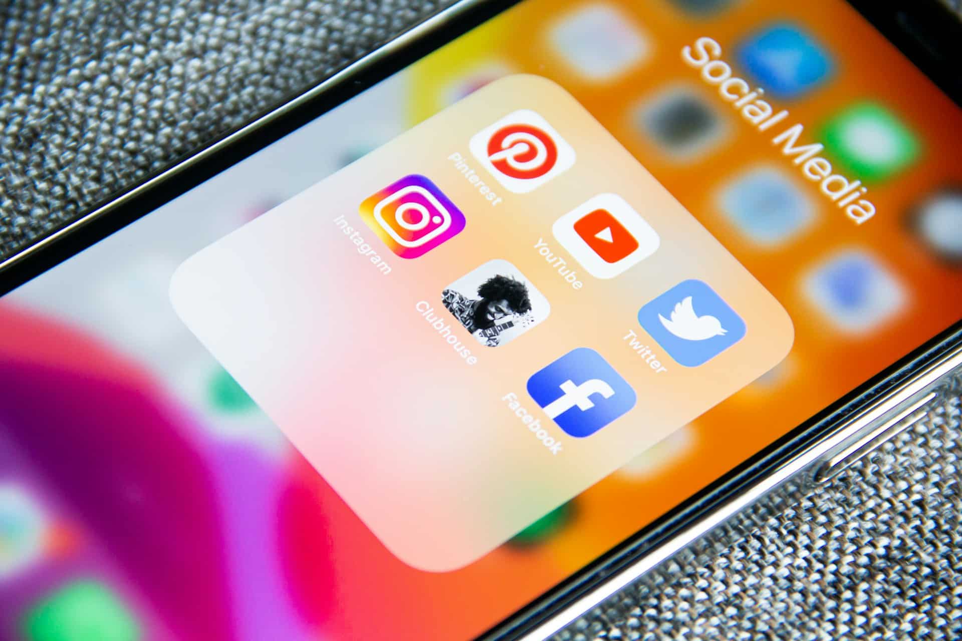A phone screen displaying social media apps, representing employee social media.